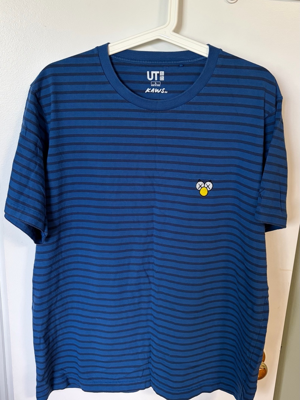 KAWS Blue Navy Striped Short Sleeve Tee with Yellow Patch - Picture 2 of 4
